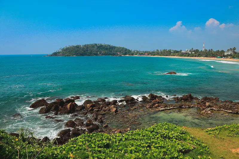 Turquoise sea and rocky headland on the south coast near Mirissa